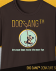 A dark chocolate unisex T-shirt from the Dog Gang™ Signature Series, Volume 3, features playful DOG GANG™ text with a dog on a rope in a circle. Made from soft-style Baumwolle for comfort and fun.