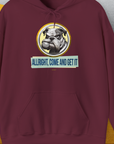The maroon hoodie showcases a funny dog design with a playful bulldog and the text “ALLRIGHT, COME AND GET IT” boldly displayed. Designed by Dog Gang.