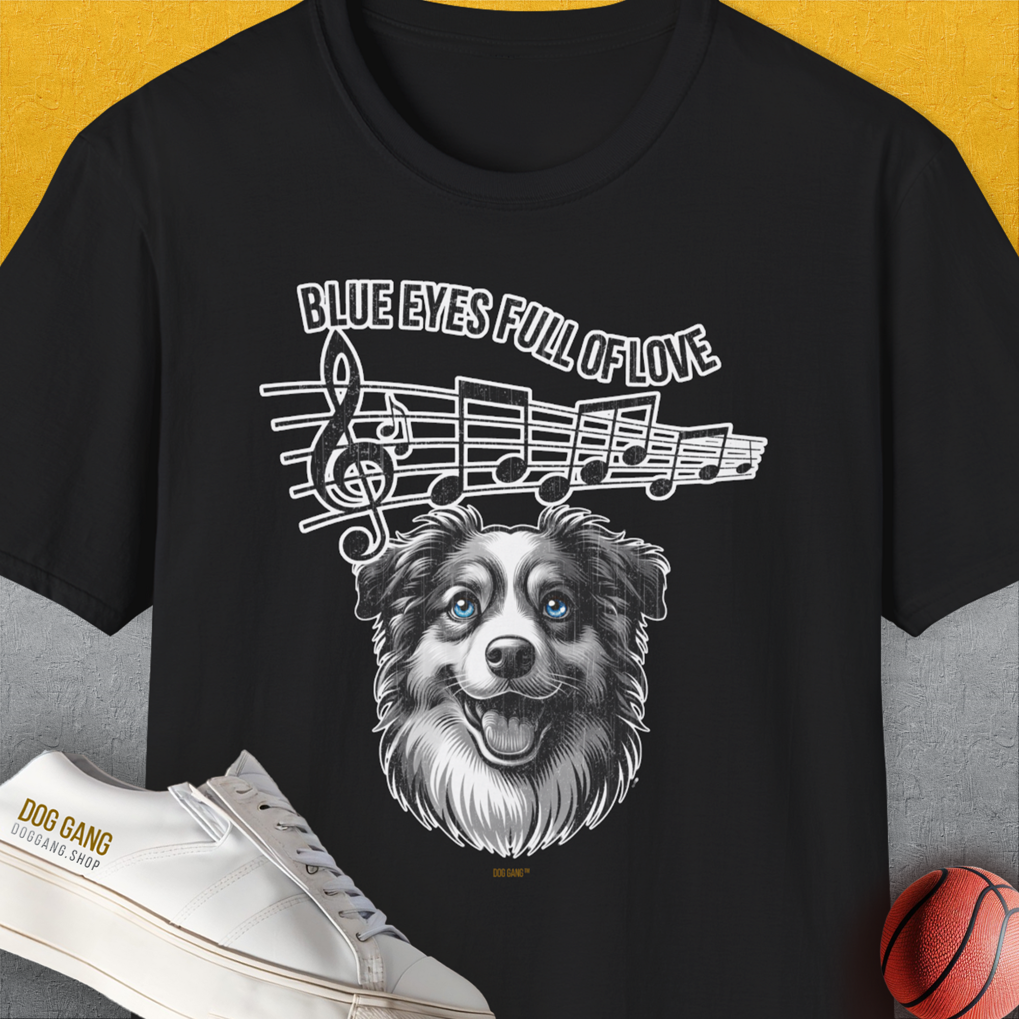 Cheerful Aussie Shepherd with music notes, shoe, basketball, and Blue Eyes Full of Love slogan. Perfect for dog person or dog lover gift. Designed by Dog Gang.