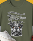 Military Green unisex t-shirt featuring a bulldog with musical notes, text: Brown Eyes, My Baby Has Brown Eyes… Perfect for any dog lover gift. Designed by Dog Gang.