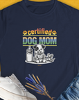 Navy Dog Mom Series, Volume 1 womens tee. Features a cute puppy, bottle, and toy design with a dog pun quote. Perfect for any dog lover gift. Designed by Dog Gang.
