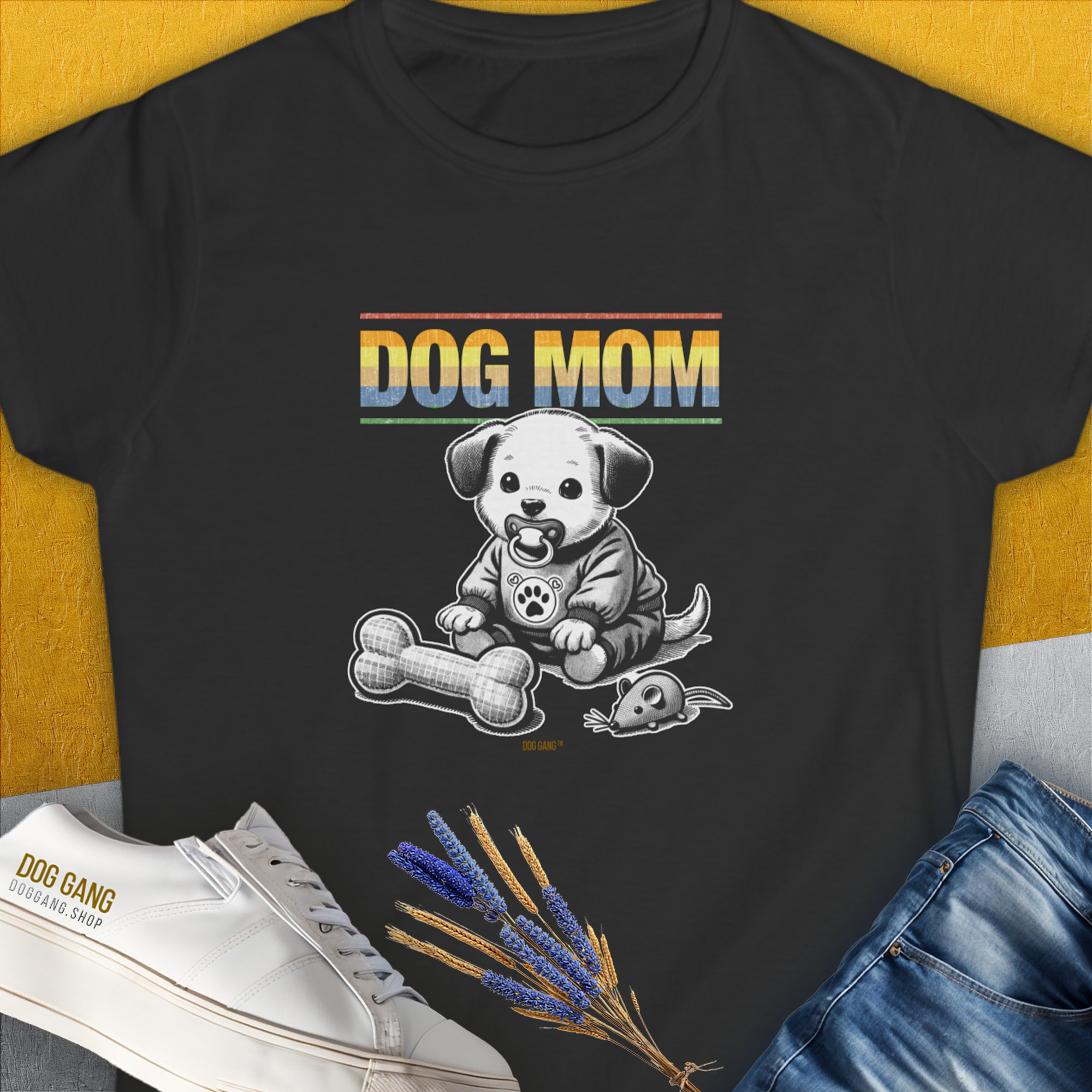 The Dog Mom Series, Volume 2 Womens T-Shirt showcases Dog Mom with a cute puppy design. Perfect for any dog lover. Designed by Dog Gang.