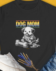 The Dog Mom Series, Volume 2 Womens T-Shirt showcases Dog Mom with a cute puppy design. Perfect for any dog lover. Designed by Dog Gang.