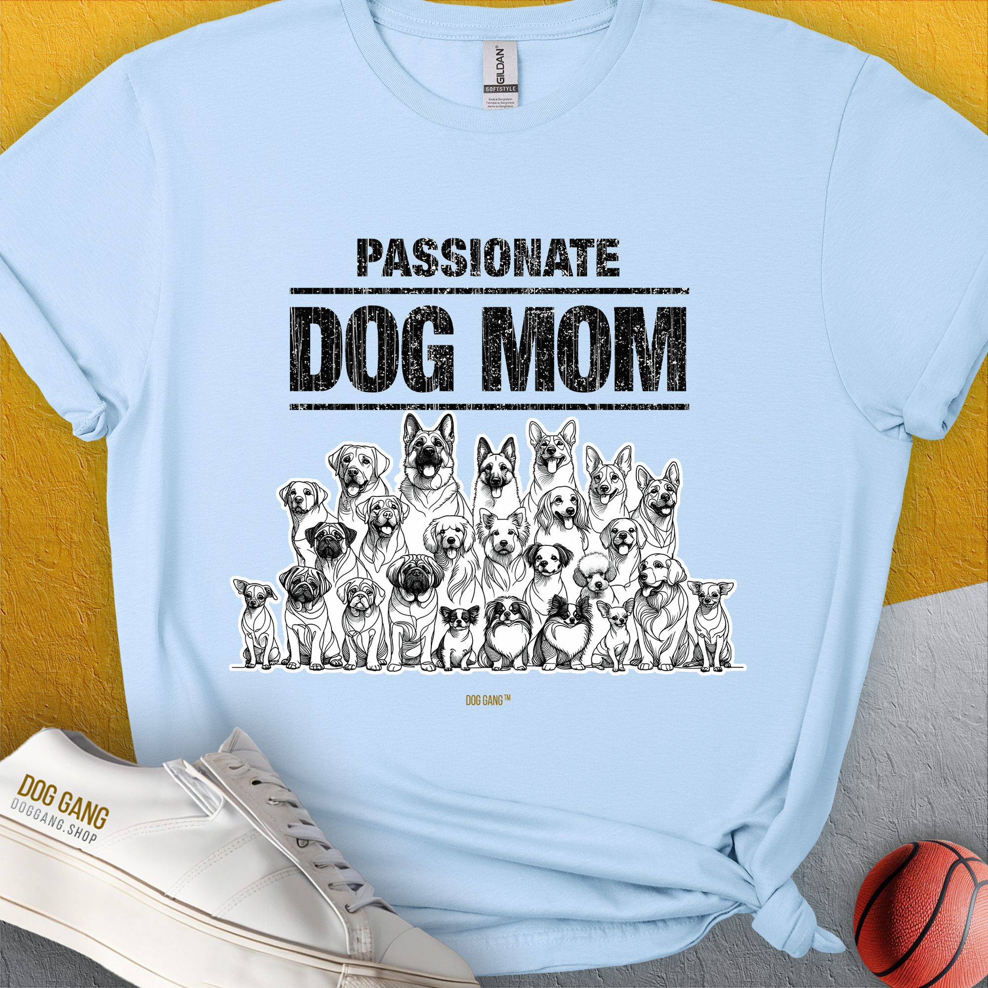 The Dog Mom Series, Volume 8 unisex t-shirt showcases Passionate Dog Mom text with illustrated dogs for the ultimate dog lover gift. Designed by Dog Gang.