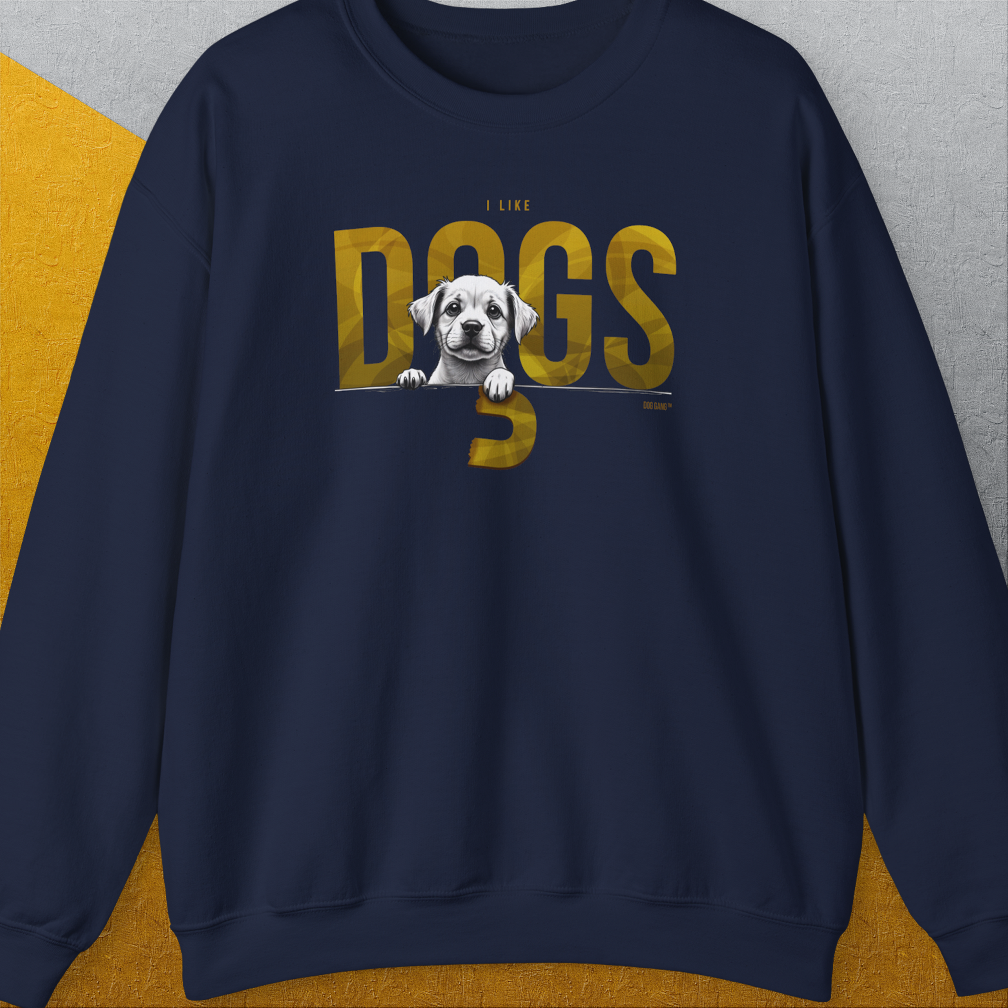 Navy sweatshirt with I LIKE DOGS and a cute puppy peeking over the letters. Perfect for dog lovers! Made from ethically grown US cotton. Designed by Dog Gang.