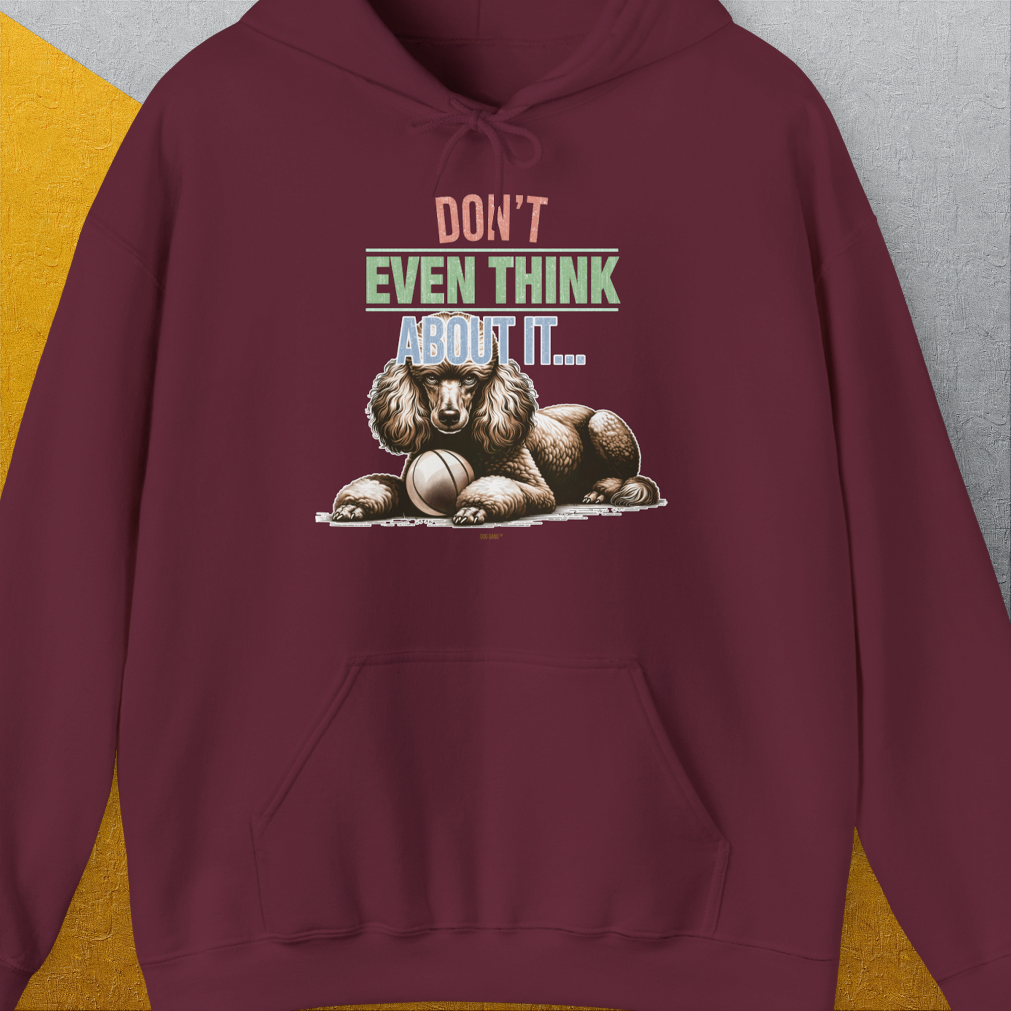 Funny dog shirt featuring a poodle guarding his fetch ball with vibrant text: "Dont Even Think About It...", Volume 1. Cute dog design for a lighthearted style. Designed by Dog Gang.