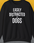 Featuring the quote Easily Distracted By Dogs, this vintage design is perfect for any dog person who loves a cozy blend of humor and style. Designed by Dog Gang.