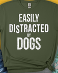 The Easily Distracted By Dogs Series, Volume 4, Unisex T-Shirt in military green features a funny dog-themed quote. This cotton tee is perfect for any dog lover. Designed by Dog Gang.