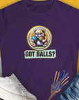 from the popular series "Got Balls?". Volume 2 Womens T-Shirt in purple features a funny bulldog graphic holding fetch balls in his mouth with the text GOT BALLS?. Designed by Dog Gang.