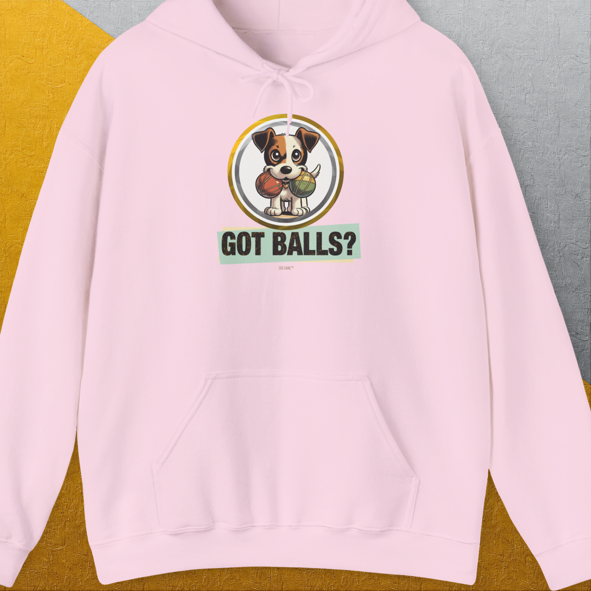 Unisex "Got Balls?" Volume 5 hoodie in soft cotton-poly blend, light pink, featuring a cartoon dog with two fetch balls and Got Balls? caption. Designed by Dog Gang.