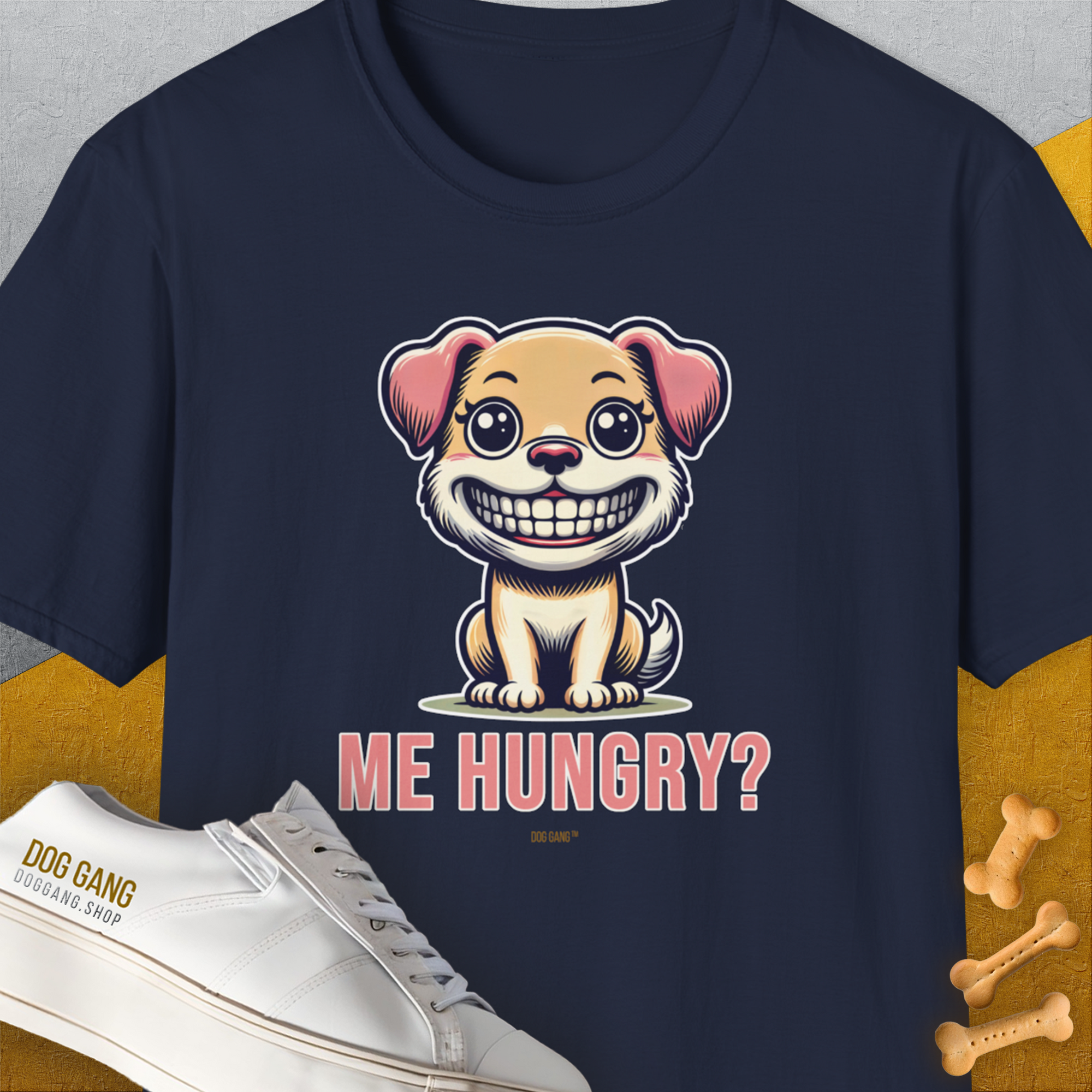 The navy unisex T-shirt showcases a smiling cartoon dog with the phrase ME HUNGRY? in bold lettering—perfect for any dog lover. Designed by Dog Gang.