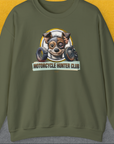 The Motorcycle Hunter Club, Volume 1 Unisex Sweatshirt in military green features a cute slightly battered dog with a black eye and the humorous slogan "Motorcycle Hunter Club". Designed by Dog Gang. A great gift for any dog lover, or as a fun gift.