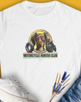 White Womens T-shirt featuring a a funny graphic of a slightly battered Dachshund with a black eye and the slogan "Motorcycle Hunter Club". Volume from the popular MOTORCYCLE HUNTER CLUB-series. Perfect for any ironic dog lover. Design by Dog Gang.