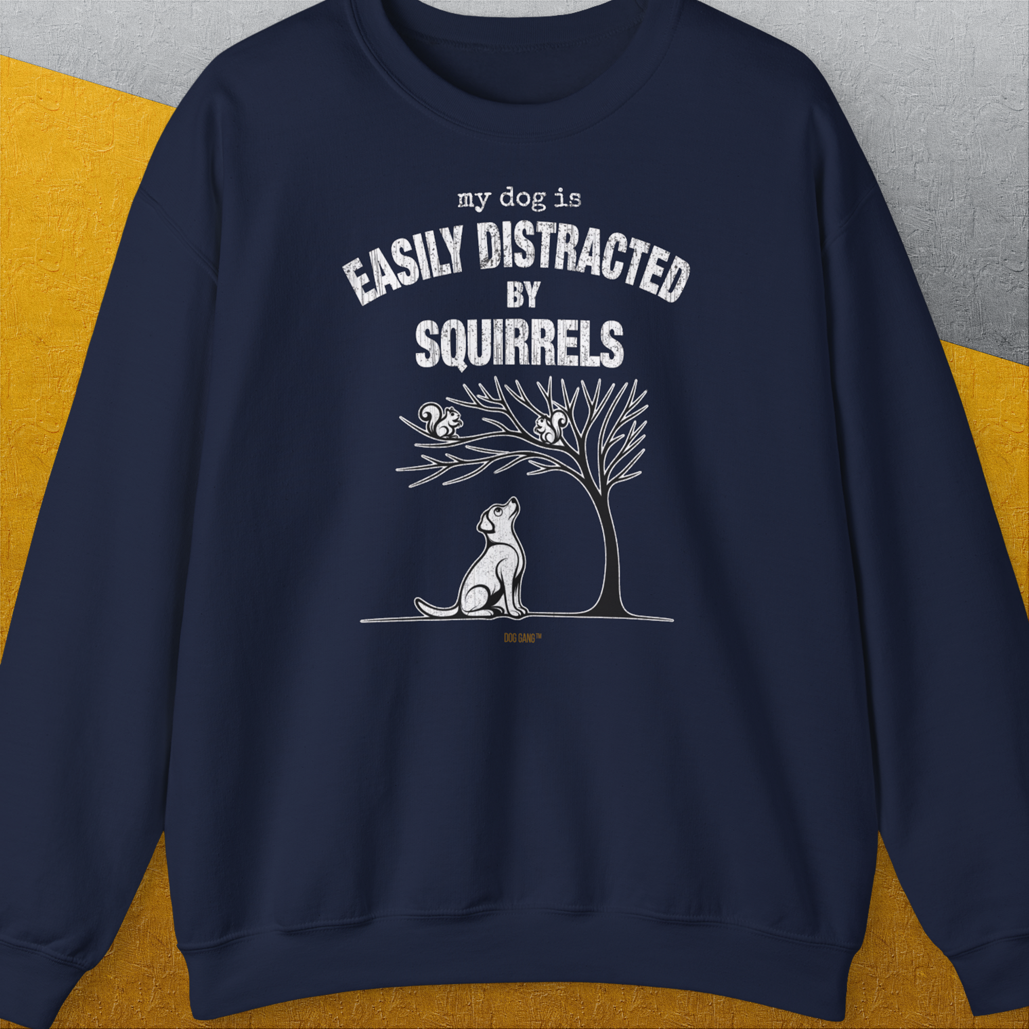 The design features a funny dog distracted by squirrels, perfect for any dog person. Designed by Dog Gang.