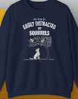 The design features a funny dog distracted by squirrels, perfect for any dog person. Designed by Dog Gang.