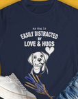 The My Dog Is Easily Distracted By - Volume 3: Love And Hugs navy womens t-shirt features a cute dog design and playful text, perfect for a dog lover gift. Designed by Dog Gang.