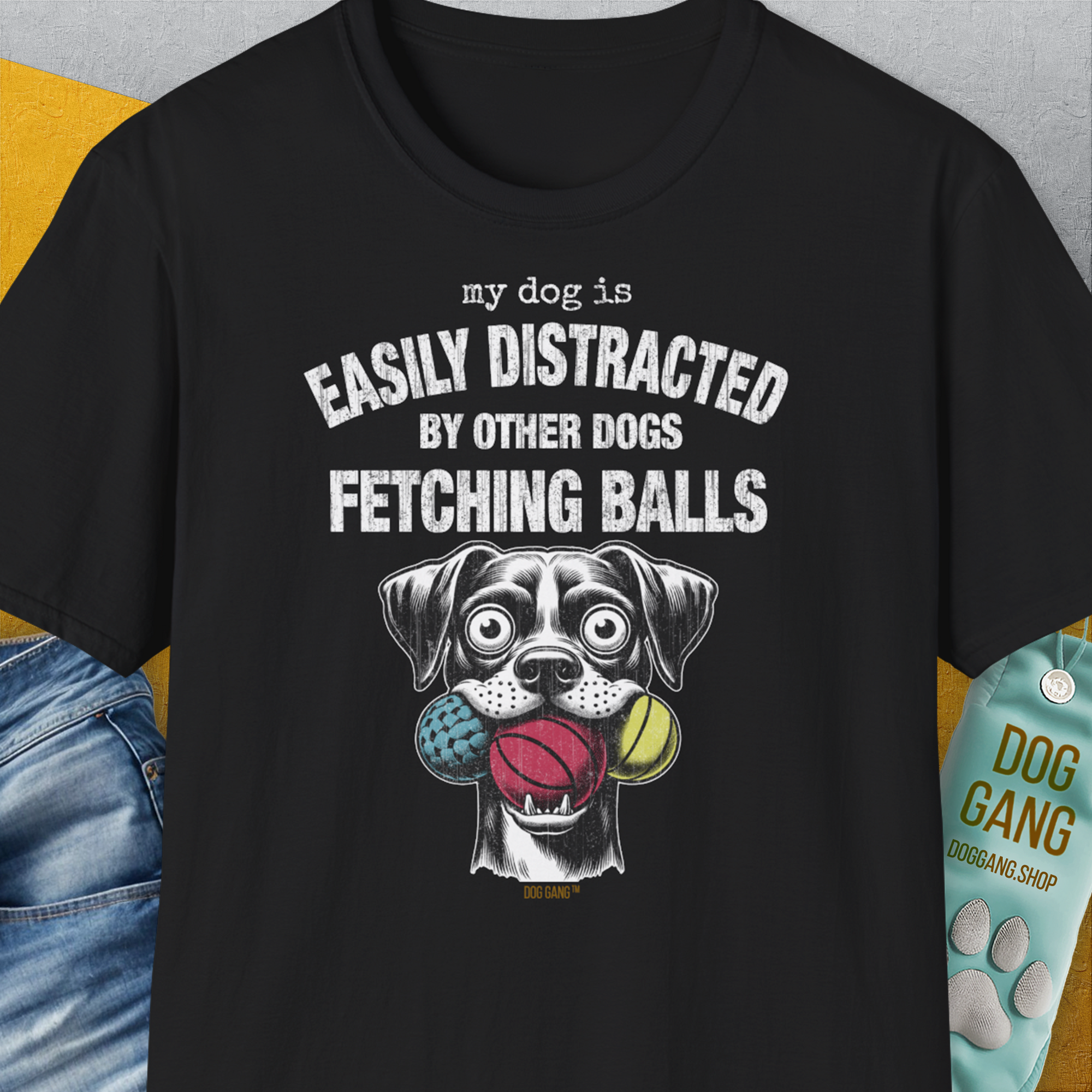 Enjoy the black My Dog Is Easily Distracted By - Volume 4: Other Dogs Fetching Balls T-shirt. A funny dog shirt with a playful illustration, perfect for any dog lover. Designed by Dog Gang.