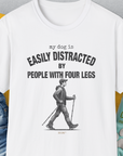 The My Dog Is Easily Distracted By - Volume 5: People With Four Legs unisex T-shirt is a funny dog shirt on soft, white 100% cotton with a playful message and man-walking illustration. Designed by Dog Gang.