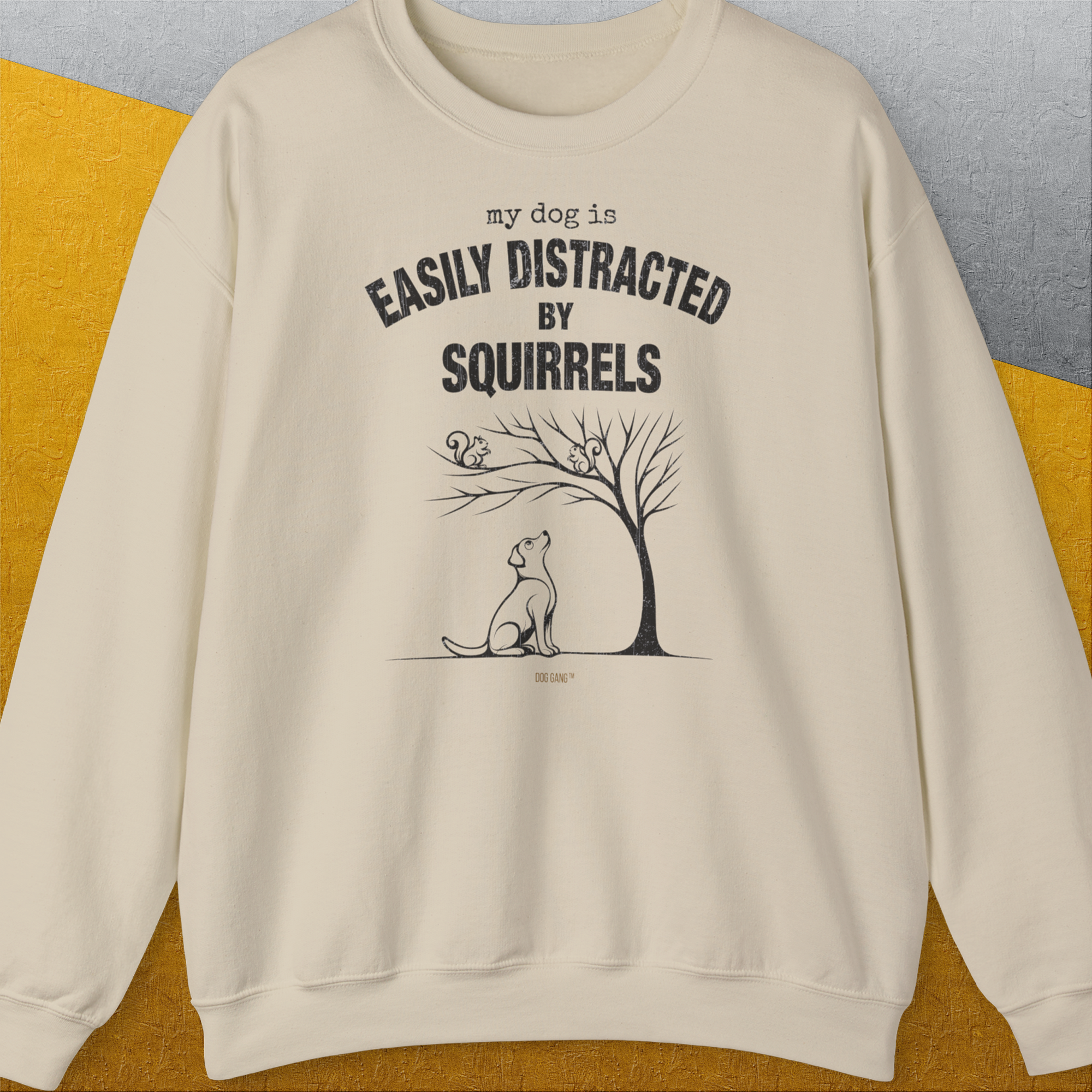 My Dog Is Easily Distracted By - Volume 1: Squirrels, Unisex Sweatshirt-Sand. A dog-themed Design from Dog Gang