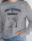 My Dog Is Easily Distracted By - Volume 1: Squirrels, Unisex Sweatshirt-, Design by Dog Gang