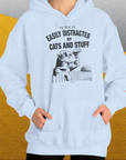 My Dog Is Easily Distracted By - Volume 2: Cats And Stuff, Unisex Hoodie-, Design by Dog Gang