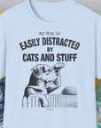 My Dog Is Easily Distracted By - Volume 2: Cats And Stuff, Unisex T-Shirt-Light Blue, Design by Dog Gang