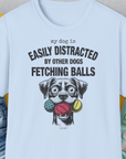 My Dog Is Easily Distracted By - Volume 4: Other Dogs Fetching Balls, Unisex T-Shirt-Light Blue. A perfect gift for dog lovers and dog owners. Design by Dog Gang