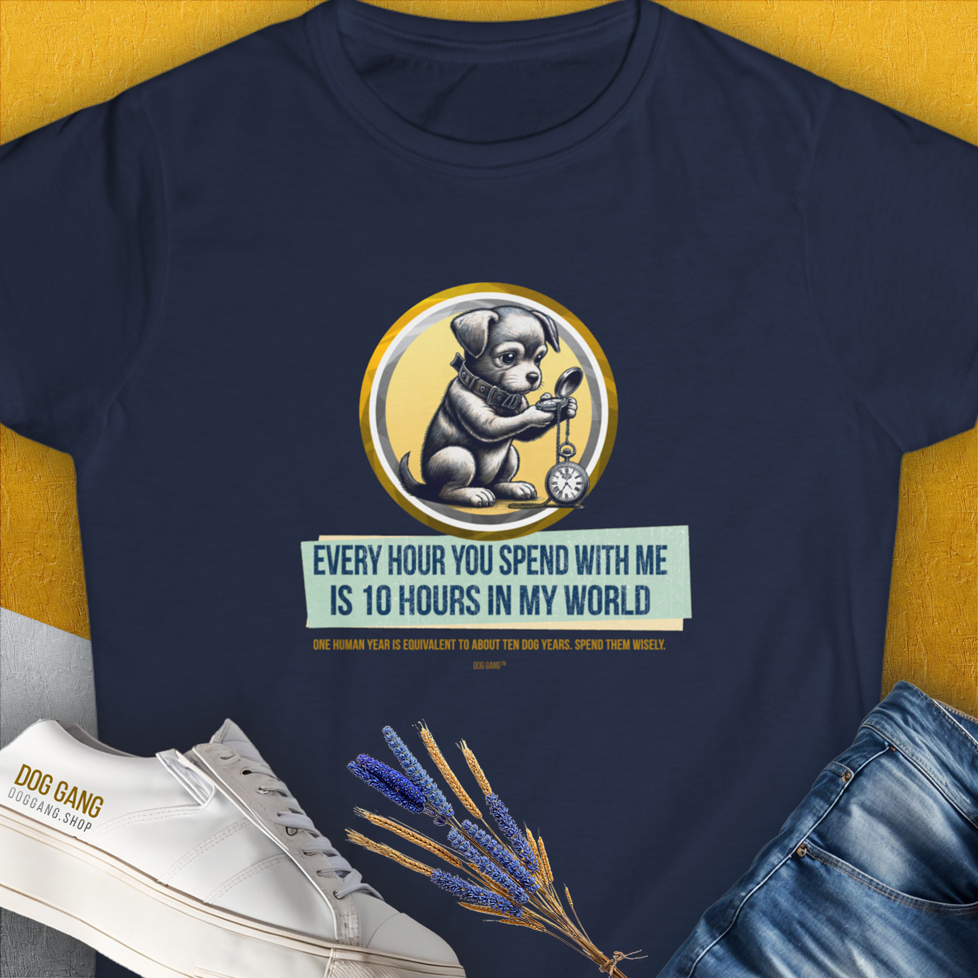 The One Human Year = Ten Dog Years, Volume 1 T-shirt in navy showcases a cute dog design, highlighting the time difference concept between dog and human years. Designed by Dog Gang.