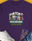 Purple tee with a cartoon poodle and the quote, Police Dog Squad For Small Matters (Toy Poodle Division), Volume 2. Perfect for dog lovers. Designed by Dog Gang.