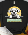 Schwarzes Unisex-T-Shirt aus 100 % Baumwolle mit einer süßen Welpenillustration und dem Text „Say Hi to all the dog lovers out there“. Perfekt für Hundeliebhaber. Design von Dog Gang.