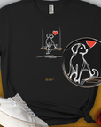 Minimalistic black tee featuring a dog on a swing beneath a red heart, perfect for any dog lover. Designed by Dog Gang.