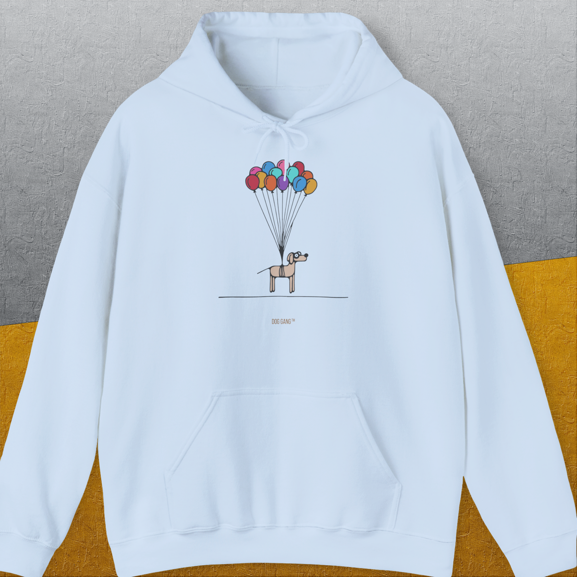 Funny dog shirt: A cartoon dog holding colorful balloons. Designed by Dog Gang.