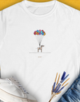 Cute dog design featuring a cartoon pup lifted by colorful balloons adds a whimsical touch thats perfect for any dog lover. Designed by Dog Gang.