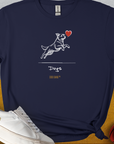 The Dog Gang Minimalistic Series I, Volume 3 Unisex T-Shirt showcases a cute dog design with a simple dog graphic and the word Dogs printed on navy blue cotton. Designed by Dog Gang.
