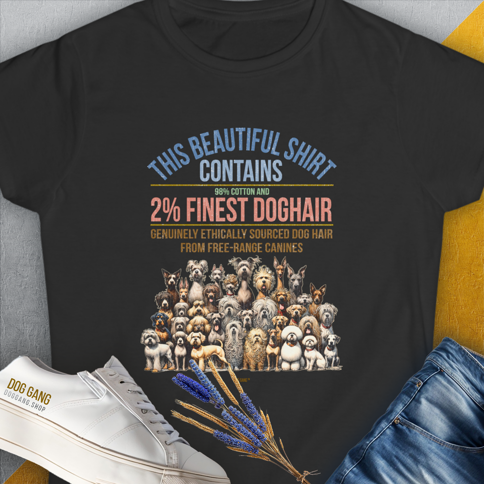 The black womens T-shirt features playful dog illustrations and the humorous saying, "This Beautiful Shirt Contains Finest Dog Hair." Volume 6 from the popular series of the same name. Perfect for every dog lover. Designed by Dog Gang.