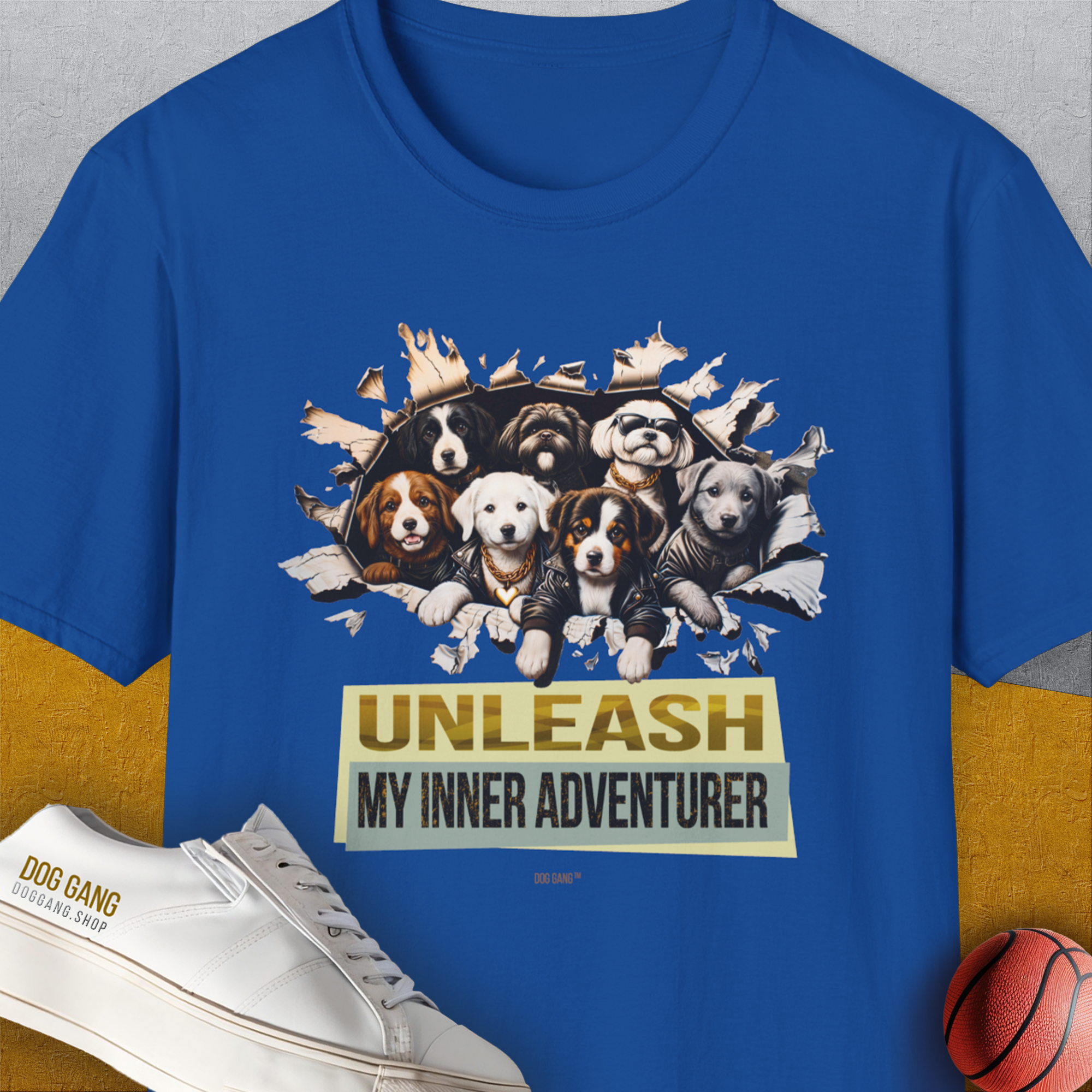 This dog-themed T-shirt showcases playful puppies with a small basketball, embodying a sense of adventure. Designed by Dog Gang.