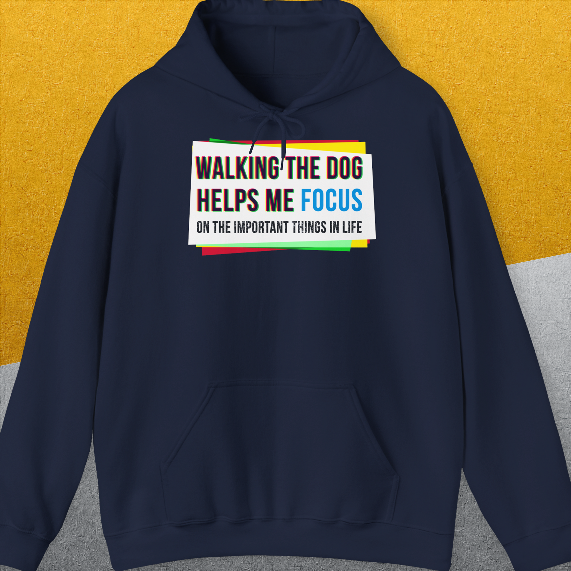 Designed by Dog Gang. This funny dog-themed hoodie displays the saying: Walking the dog helps me focus on the important things in life. Perfect for any dedicated dog lover.