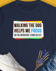 Designed by Dog Gang, this dog-themed tee includes text graphics that say, Walking The Dog Series One, Volume 1, perfect for any dog lover looking for a cute dog design.