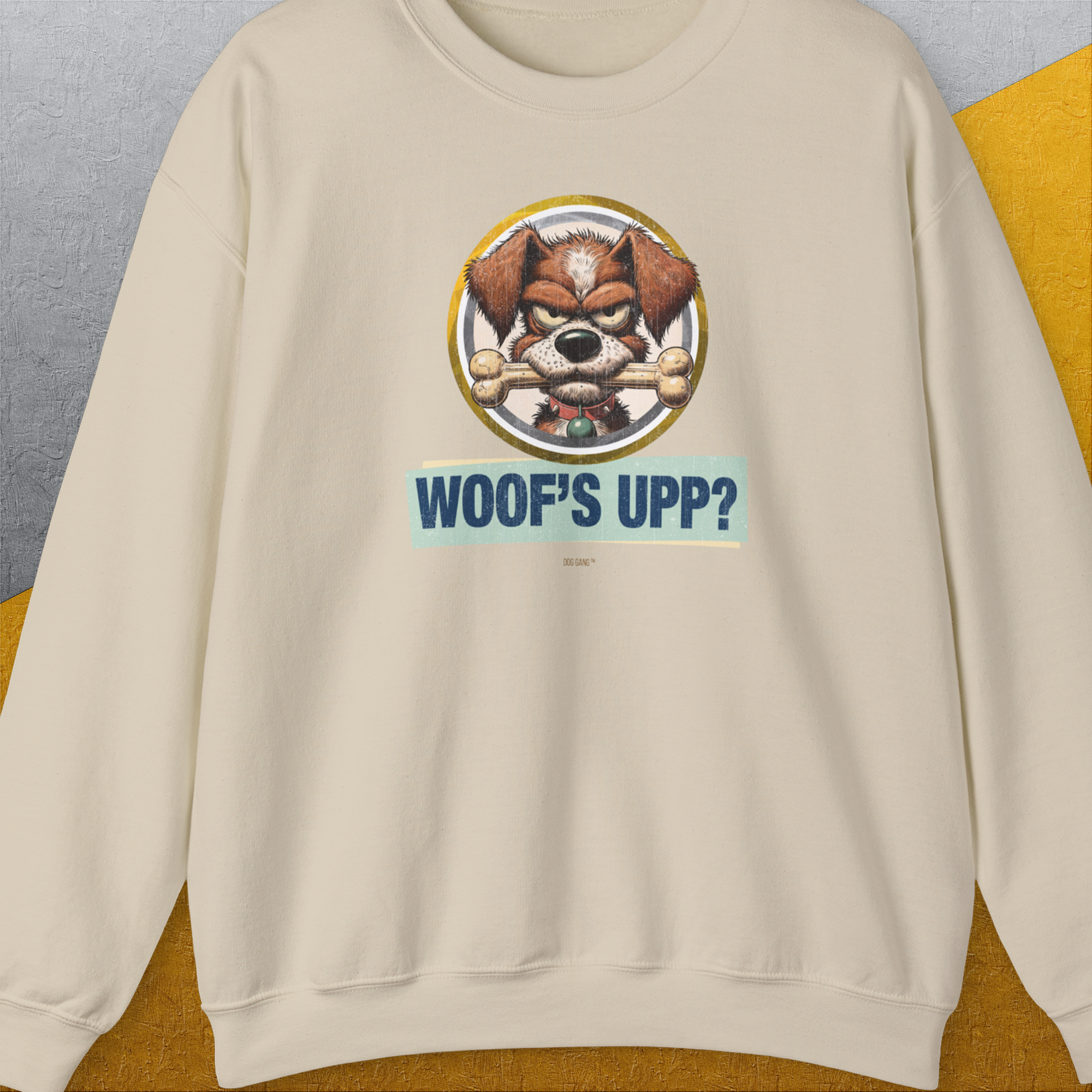 Woof's Upp? Volume 2, Unisex Sweatshirt-Sand. A perfect gift for dog lovers and dog owners. Design by Dog Gang