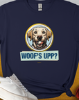 Unisex navy cotton blend T-shirt features a funny dog design with the phrase Woofs Upp? Volume 3 and a playful dog paired with a small basketball. Designed by Dog Gang.