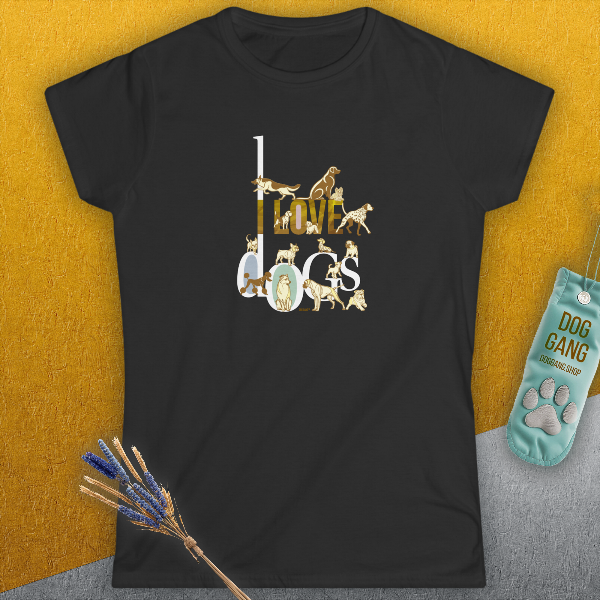 The I Love Dogs - Series I, Volume 1, Womens T-Shirt features a cute dog design on black softstyle fabric. The phrase I Love Dogs is styled with adorable dog illustrations embedded within the letters. Crafted from 100% ringspun cotton. Designed by Dog Gang.