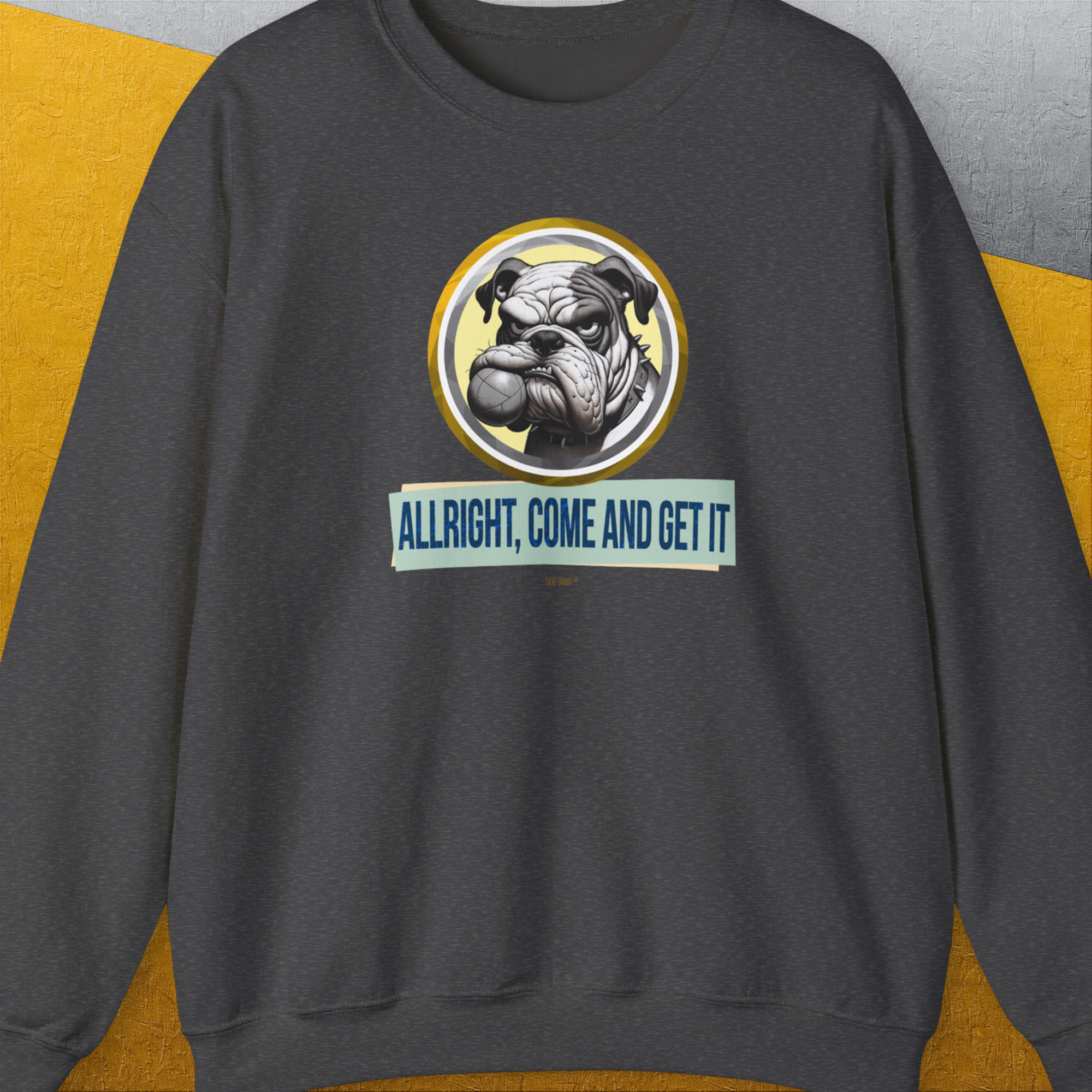 Funny dog shirt featuring a bold funny bulldog with a fetch ball in his mouth with the text Alright, Come and Get It. Designed by Dog Gang.
