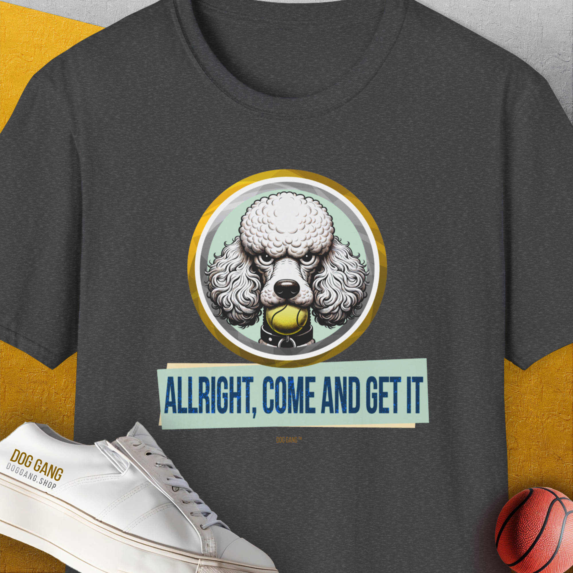 Playful poodle with a tennis ball and the words ALLRIGHT, COME AND GET IT. A fun tee for any dog person. Designed by Dog Gang.