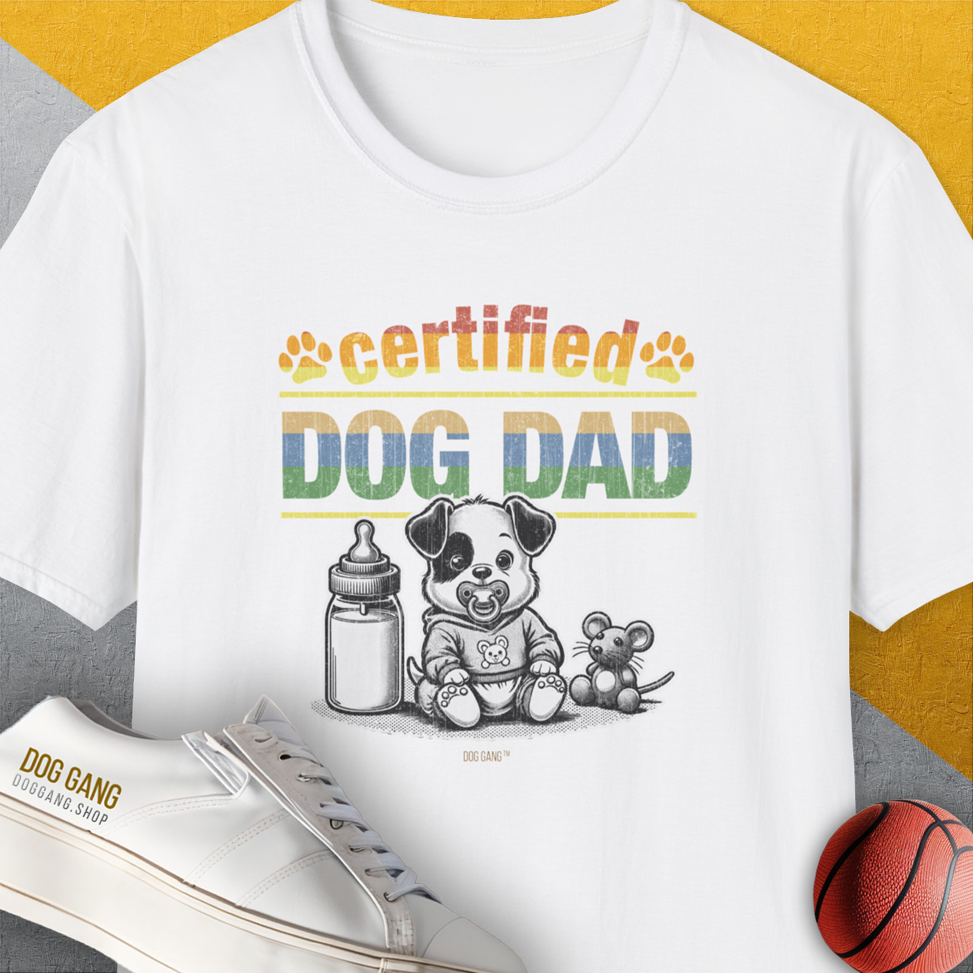 Certified “Dog Dad” text featuring a very cute cartoon puppy, a baby milk bottle and a stuffed mouse toy. Cute dog design for the ultimate dog owner. Designed by Dog Gang.