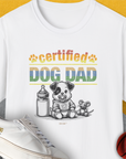 Certified “Dog Dad” text featuring a very cute cartoon puppy, a baby milk bottle and a stuffed mouse toy. Cute dog design for the ultimate dog owner. Designed by Dog Gang.