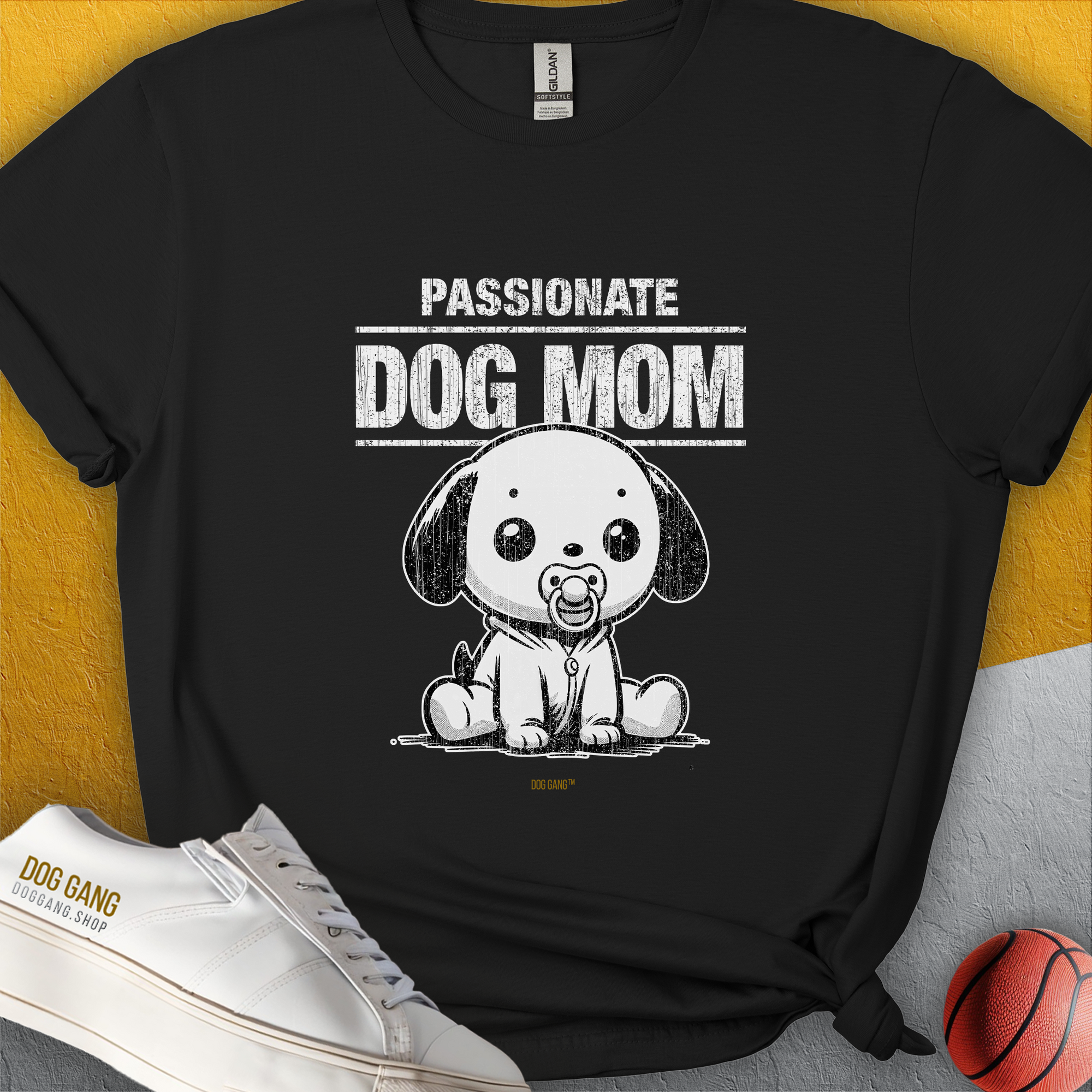 The Dog Mom Series, Volume 7 unisex T-shirt is black with a cute cartoon dog, proudly saying Passionate Dog Mom—perfect for any dog lover. Designed by Dog Gang.