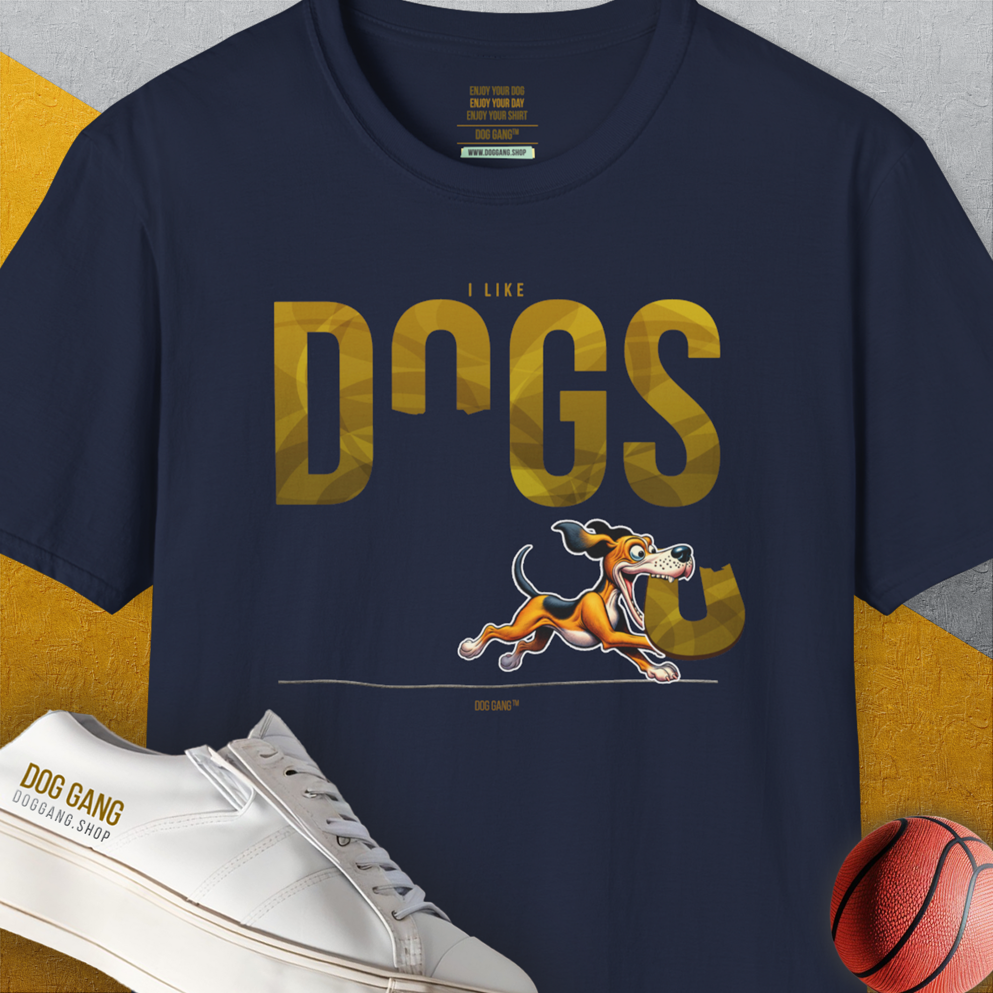 The navy shirt features I Like Dogs text alongside a running dog graphic and a basketball, perfect for any dog lover. Designed by Dog Gang.