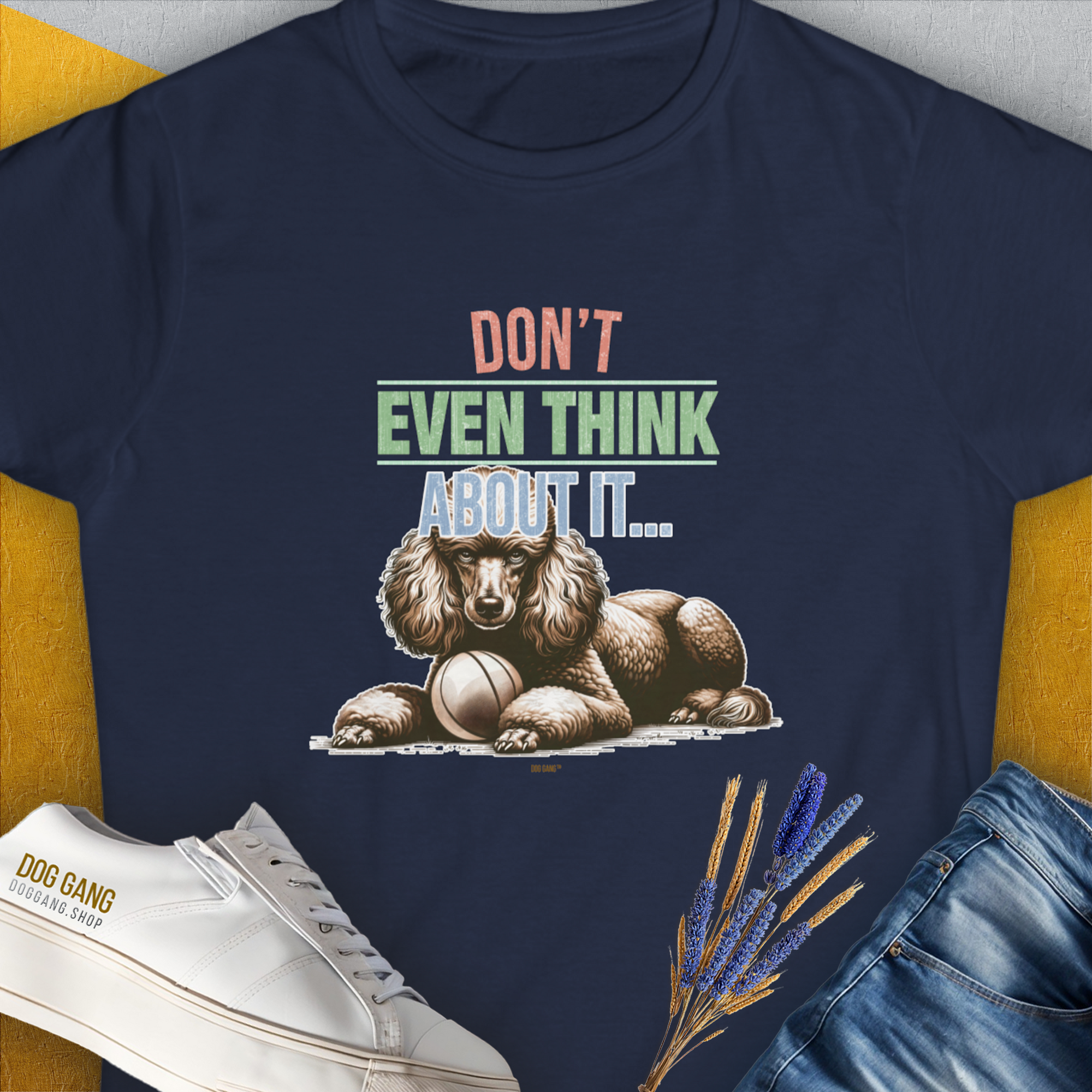 The Dont Even Think About It... shirt showcases a playful dog illustration with the phrase Dont even think about it. A funny dog shirt for any dog lover. Designed by Dog Gang.