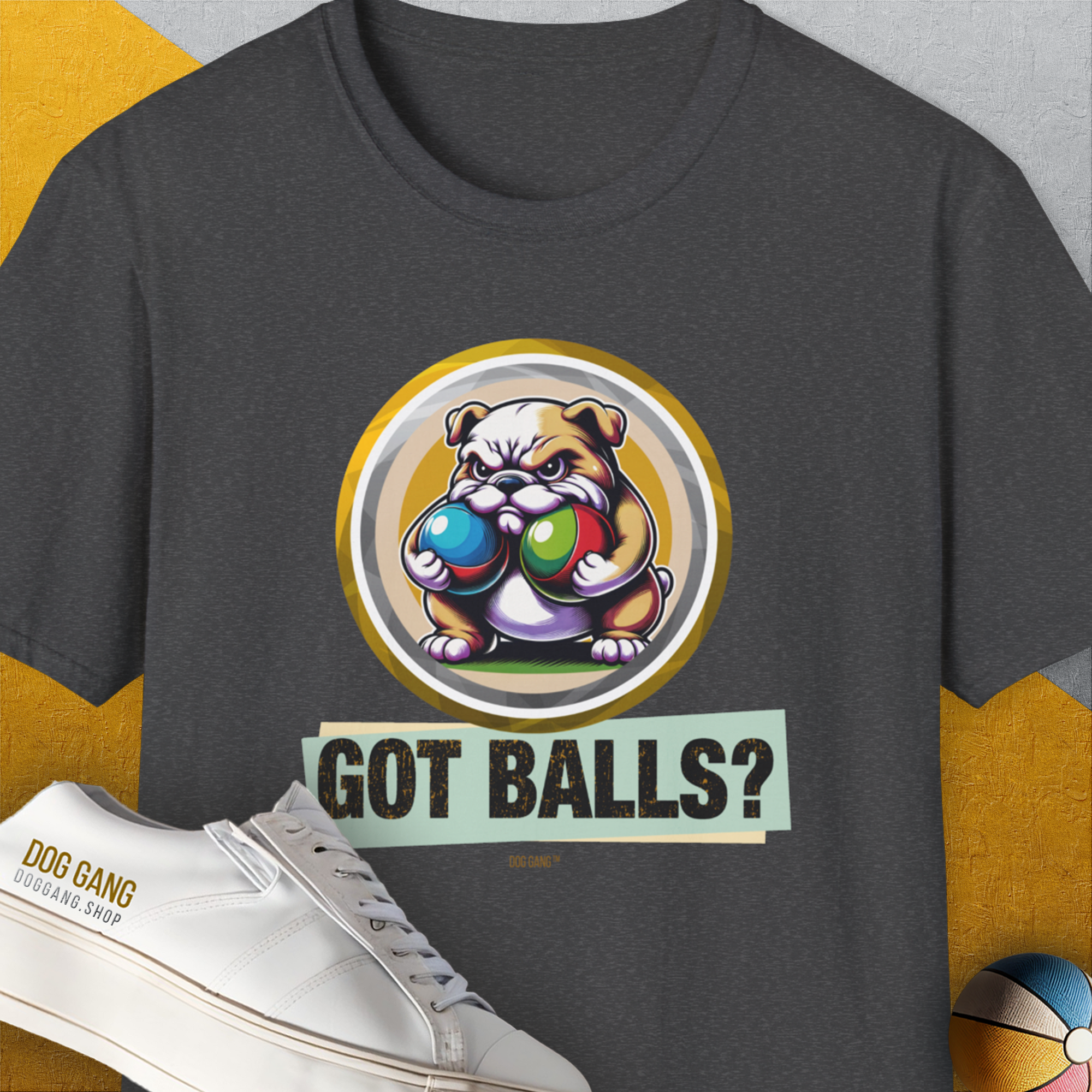 The Got Balls? Volume 2 unisex T-shirt showcases a cartoon bulldog with 2 fetch balls and playful text Got Balls? Its a funny dog shirt for any dog person. Designed by Dog Gang.