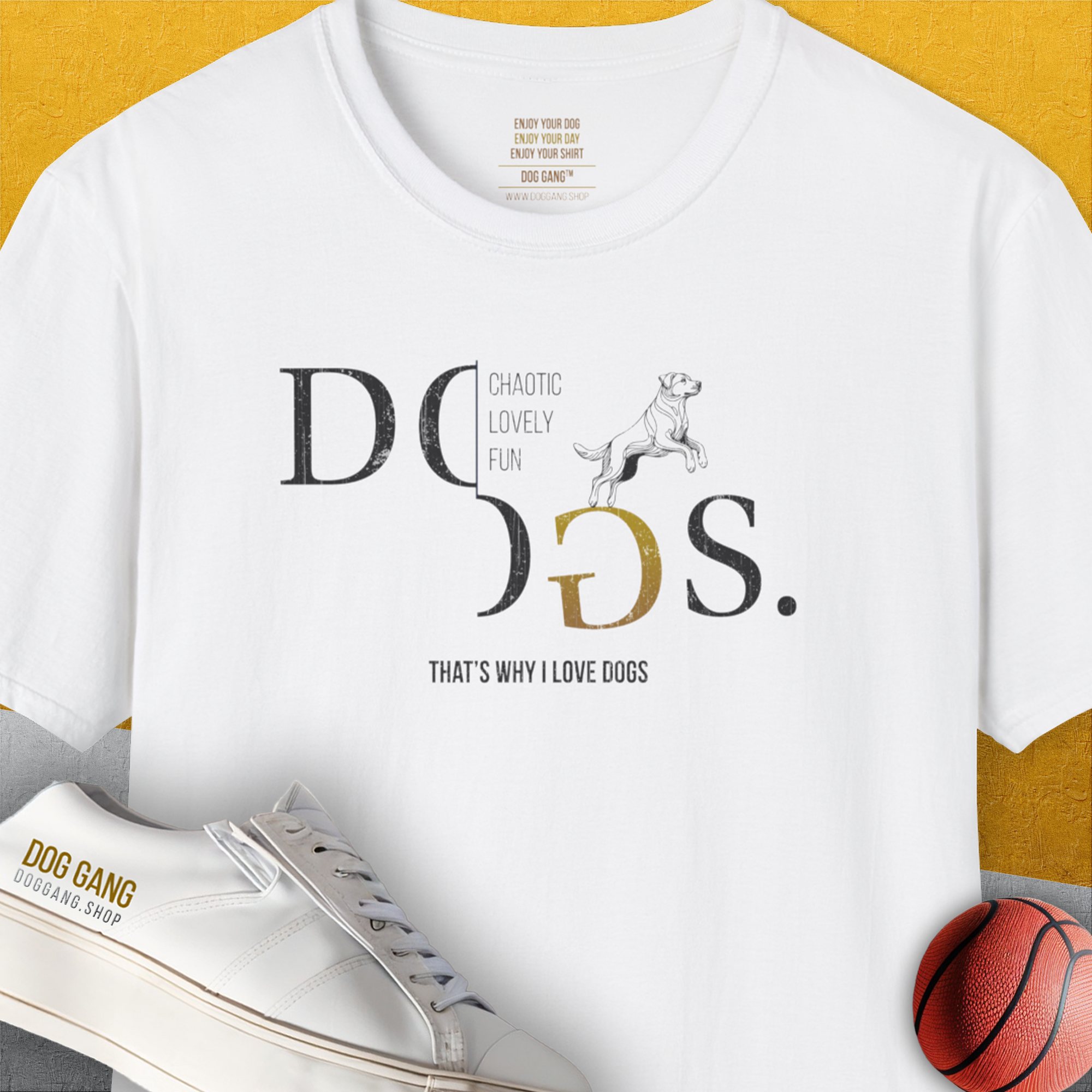 The white unisex T-shirt features DOGS with a dog and basketball illustration, capturing a playful vibe. Perfect for any dog lover. Designed by Dog Gang.